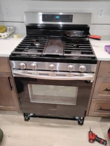 A Samsung range and oven pulled out for repair or installation by Appliance Handyman of Twin Falls, ID