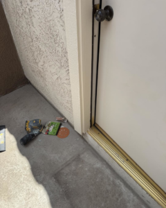 Power sander and sandpaper on the ground for door frame repair by Eddie of all trades in Peoria, AZ