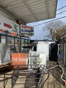 A truck bed loaded with scrap metal and old appliances for hauling by Allen's Junk Removal & Hauling in Smyrna, TN.