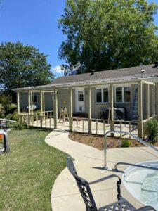 A wooden frame structure for a screened porch or addition under construction at a house, handled by Lee's Handyman Service LLC in Oxford, MS.