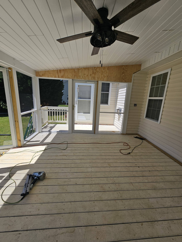 Screened porch construction in progress with subfloor and tools by TruBuilt Contracting LLC in Cary, NC