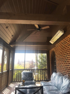 Completed screened porch with fan and heater installations by Clarke Handyman Services in San Clemente, CA.