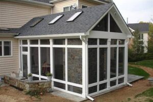 A beautiful screened-in porch addition featuring skylights, completed by RMG Construction in Chesapeake, VA.