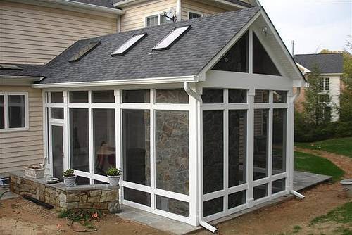 A beautiful screened-in porch addition featuring skylights, completed by RMG Construction in Chesapeake, VA.