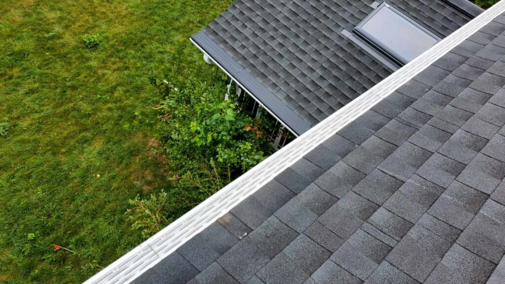 Seamless gutters and gutter guards expertly installed on a home's roof by Gutter Flow7 LLC in Madison, WI.