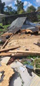 A pile of shed demolition debris including wood and roofing materials, ready for removal by Jax Junk Squad in Jacksonville, FL.
