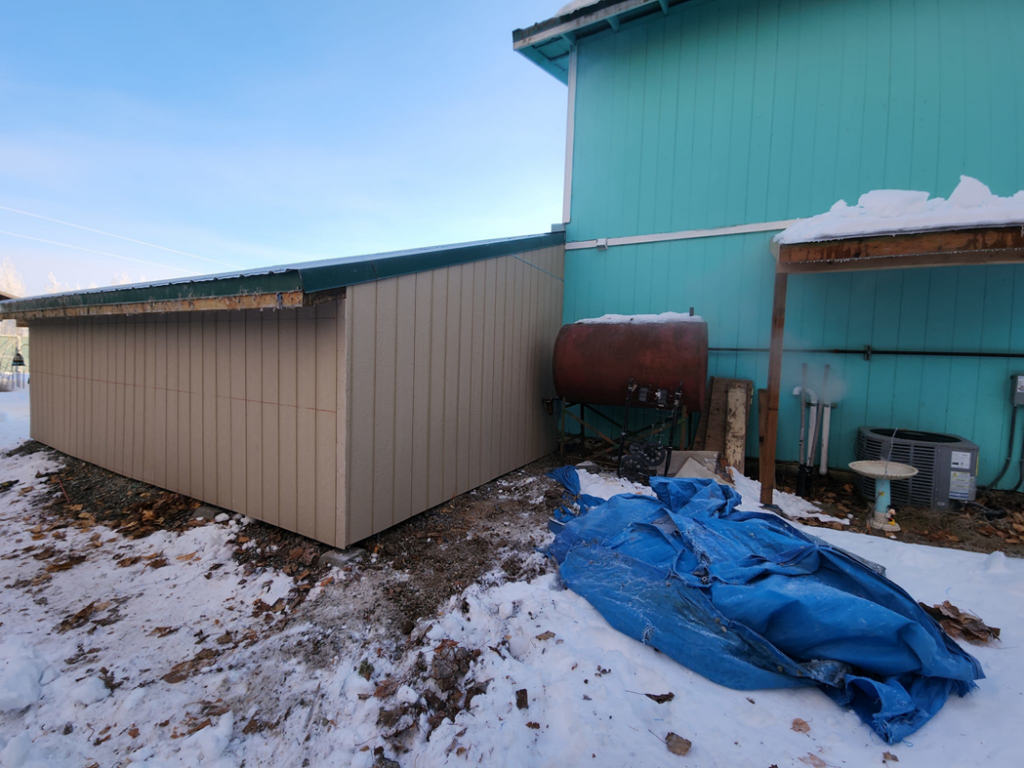 New siding installed on an outdoor shed by Sir Fix-A-Lot Handyman Services, LLC in Palmer, AK.