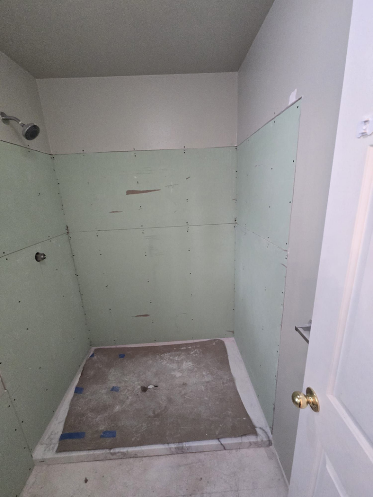 Completed installation of shower backer board and prepared shower pan base by Fullhouse Builders LLC in Gig Harbor, WA