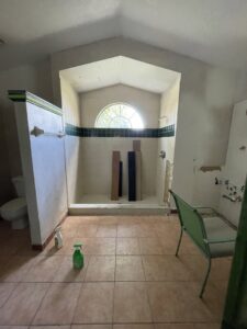 Shower framing and subfloor preparation during a bathroom renovation by Modern Construction Group Inc. in Orlando, FL.