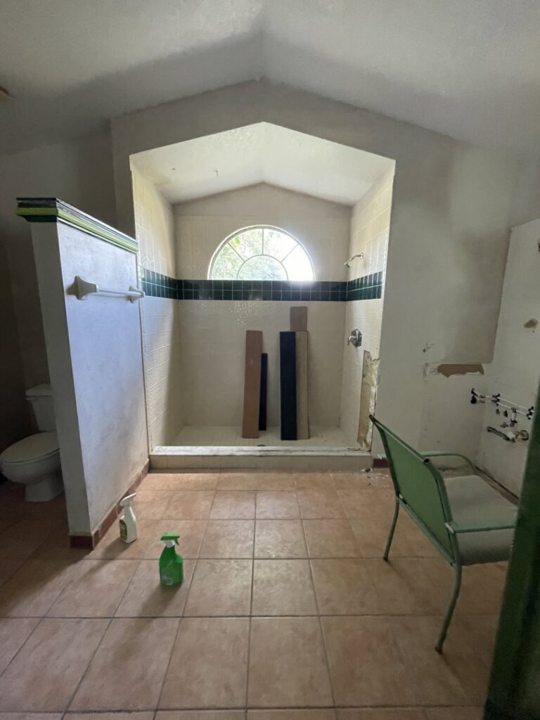 Shower framing and subfloor preparation during a bathroom renovation by Modern Construction Group Inc. in Orlando, FL.