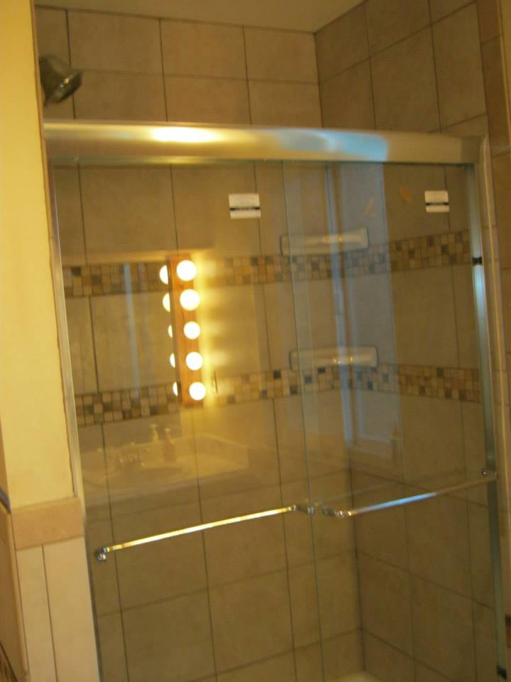 New shower pan and custom tile wall installation by Tom's Handyman Service in Arvada, CO