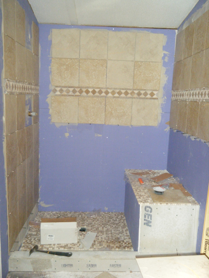 Shower tiling installation in progress by Castillo Construction Company in Malden, MA