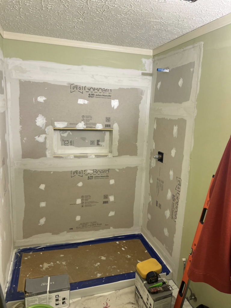 Shower walls prepared with cement board and mudding, ready for tiling by Home Changes in Knoxville, TN