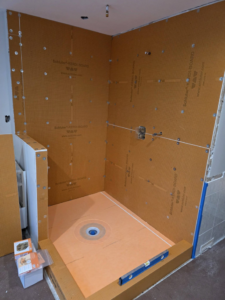 Shower waterproofing membrane installation in progress by SG Homes LLC in Rockville, MD