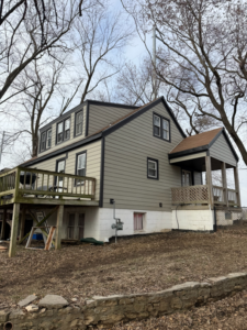 Side view of a home featuring new siding and windows installed by Kansas City Siding and Windows in Kansas City, MO.