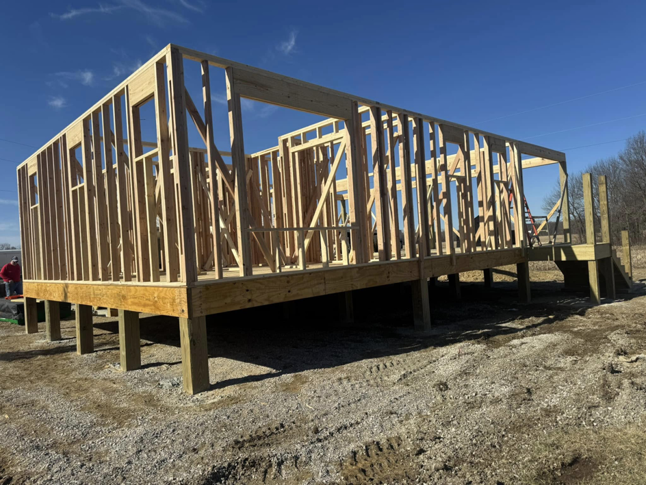 Side view of wooden house framing on a raised foundation by Phillip's Home Repair in Owensboro, KY
