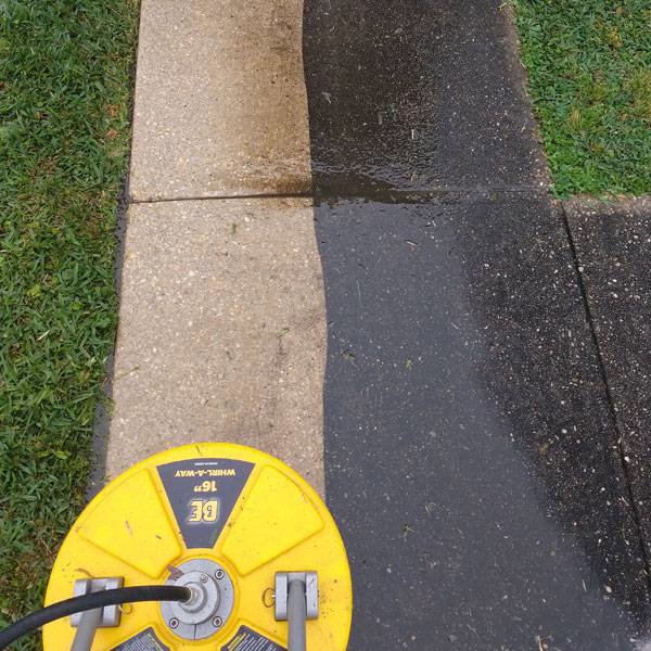 Before and after of a dirty sidewalk power washed by Total Powerwashing in Valley Park, MO.