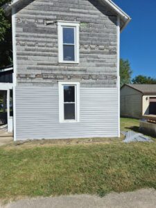 New siding installation on the exterior of a house by Handyman Service in Lafayette, IN.