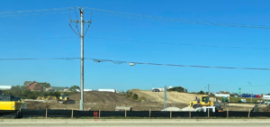 Heavy machinery performing site preparation at a construction project by R A Seaton Contractor Services in Rockford, IL.