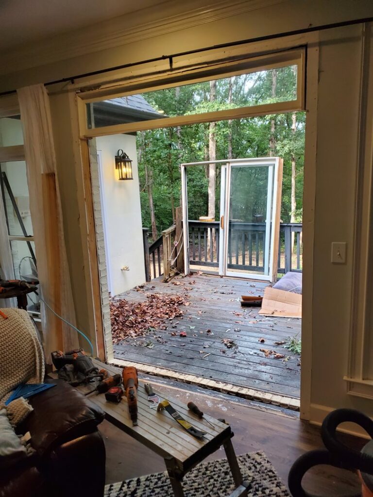 Sliding glass door replacement in progress with tools visible, performed by GCI Services, Inc. in Simpsonville, SC