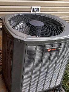 A newly installed smart thermostat showing room temperature, installed by Solar Flare Heating & Air in Dayton, OH.