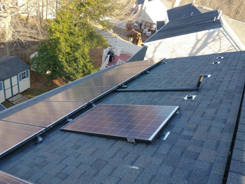 Solar panels installed on a residential roof, a service provided by Artstone Exteriors & Renovations in Myersville, MD.