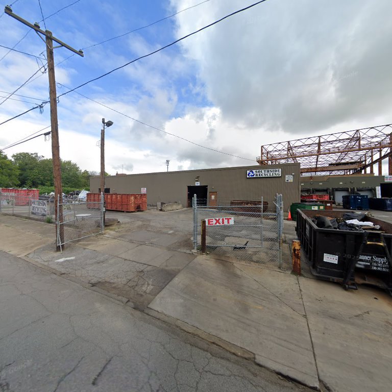 Exterior view of Southside Recycling facility with large junk and recycling containers in Youngstown, OH