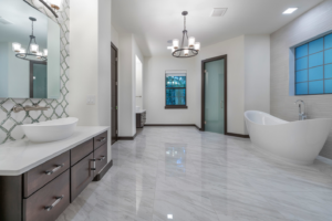 A spacious modern bathroom renovation with a freestanding tub by Cornerstone Custom Construction LLC in Beaver Falls, PA