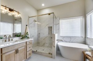 A spacious bathroom renovation featuring a walk-in shower and freestanding tub by AZ New Bath in Glendale, AZ