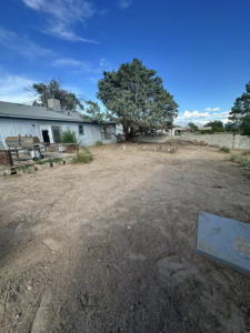 A spacious and well-maintained cleared backyard by Appleton Residential Services in Rio Rancho, NM.