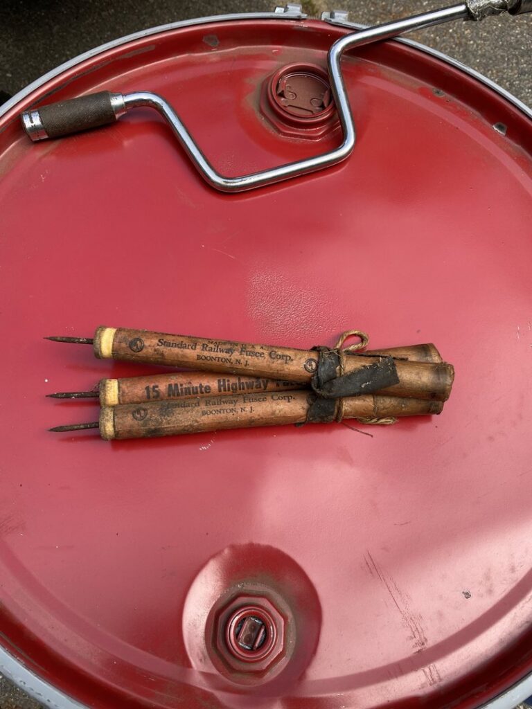 A red drum with specialized junk items for disposal by Maine Labpack, Inc. in South Portland, ME