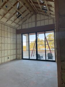 Spray foam insulation applied to walls and ceiling in a new home construction by IFOAM Insulation of Hill Country in San Antonio, TX