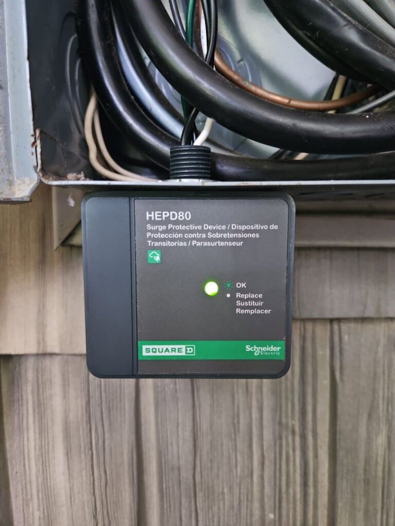 A Square D surge protective device installed within an electrical box by MorLite Electric in Newport News, VA.