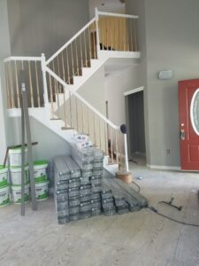 Staircase renovation with new balusters and flooring materials on site by JMQ Contractor INC in Philadelphia, PA