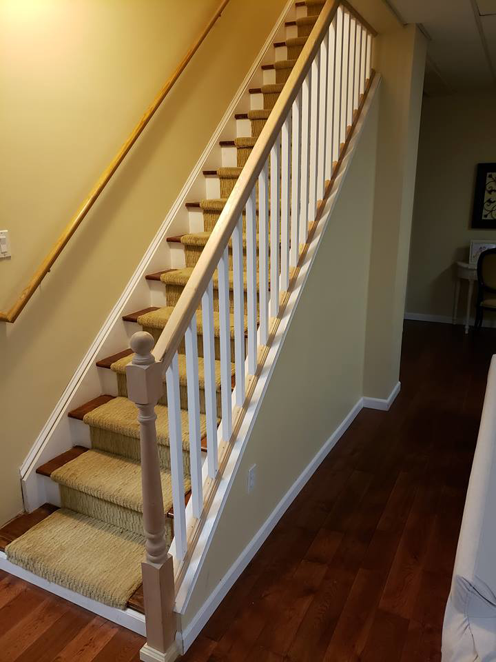 Staircase renovation featuring new balusters and handrail by Excel Home Improvement And Services in Pawling, NY