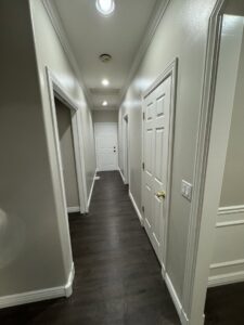 Staircase renovation with new railings and fresh paint by Handyman house repairs and remodeling in Provo, UT