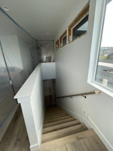 Stairwell renovation in progress with dust protection by Handyman house repairs and remodeling in Provo, UT