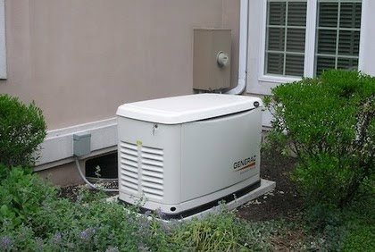 Generac standby generator installed outside a residential home, showcasing electrical services by Epic Electric, Heating, Cooling & Plumbing in Spokane, WA