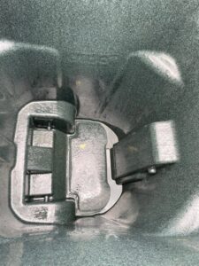 An advertisement showing before and after images of a stinky trash can interior, cleaned by Bin Blasters - Knoxville, TN.