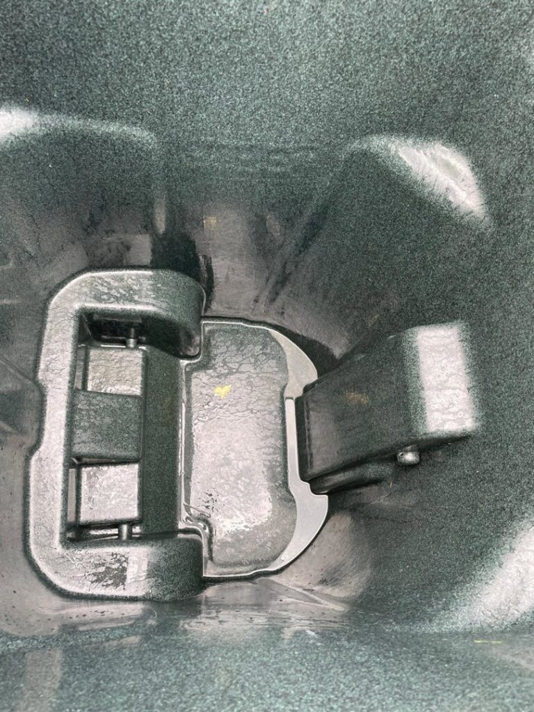 An advertisement showing before and after images of a stinky trash can interior, cleaned by Bin Blasters - Knoxville, TN.