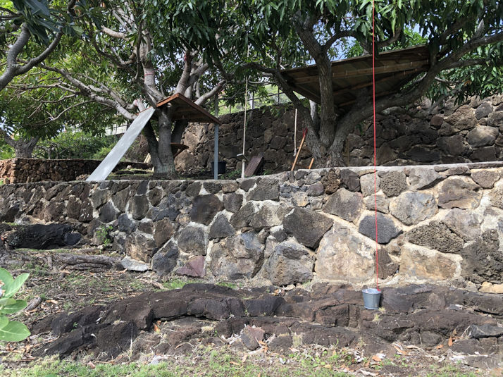 Durable stone retaining wall construction by Trusted Handyman in Honolulu, HI, providing structural and aesthetic improvements.