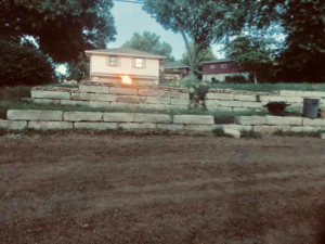 Expert stone retaining wall installation by SLR Contracting for landscaping in Chester, NY