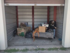 A storage unit filled with various items being cleaned out for junk removal by TrashnSell in Grand Island, NE