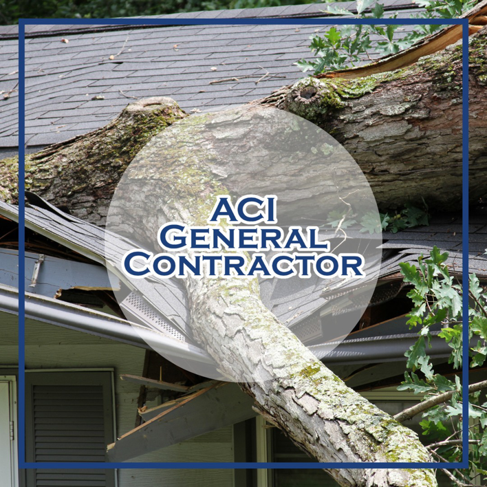 A large tree fallen on a house roof, indicating storm damage repair services by ACI - General Contractor in Montgomery, IL.