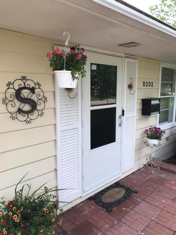 A newly installed storm door on a home, a service provided by Handyman Nextdoor in Omaha, NE