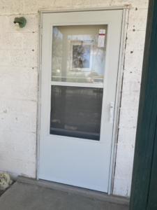 A completed storm door replacement service by King's Men in Las Cruces, NM.
