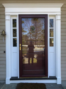 A newly installed storm door and decorative trim by Bartlett Brainard Products Co. in West Hartford, CT.