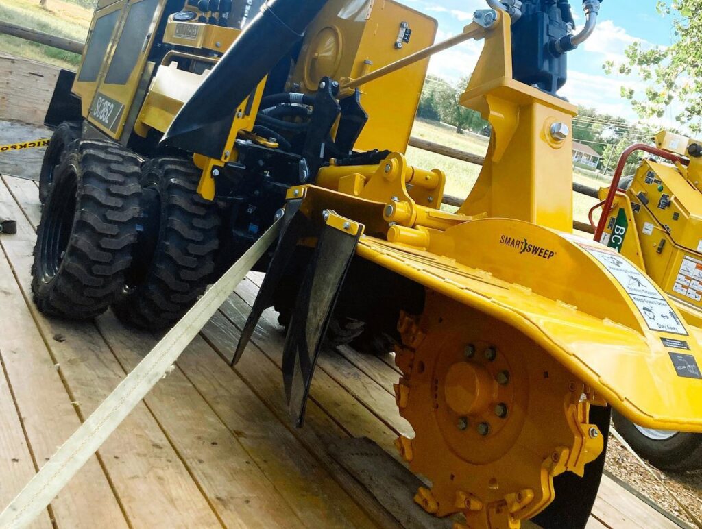 A stump grinder on a trailer, equipment used by Northern Colorado Tree Service in Fort Collins, CO.