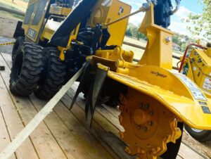 A stump grinder on a trailer, equipment used by Northern Colorado Tree Service in Fort Collins, CO.