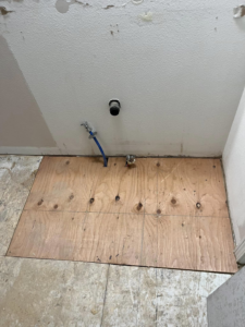 Plywood subfloor repair and plumbing preparation, indicating a handyman service by Worths handyman services in Wasilla, AK.